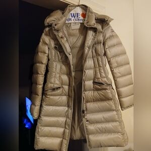 Moncler coat gently used hardly worn, great condition. Size 2/M beige or tan